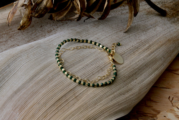 18K Gold double chain bracelet w/ Emerald stones